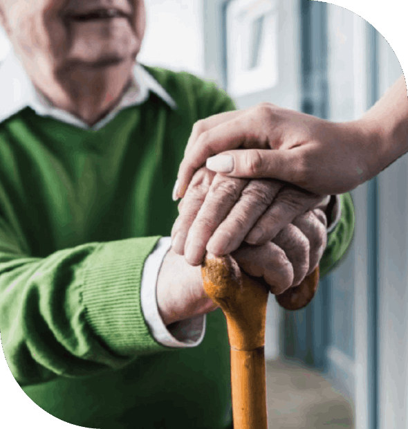 Medical staff caring for elderly patient